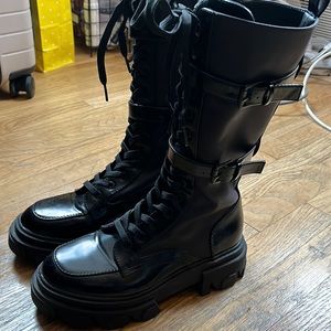 Nine West mixed media combat boots.